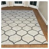 CONTEMPORARY CARPET | Grey pattern on a beige field; 7 ft. 10-1/2 in. x [some staining]