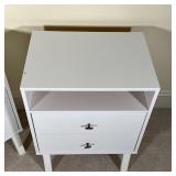 PAIR BEDSIDE STANDS | Open shelf over two drawers; particle board with some separations; 29 x 22-1/2