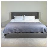 KING BED | Probably Room & Board, wool upholstered frame with lower slide-out drawer storage, with a