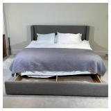 wool upholstered frame with lower slide-out drawer storage, with a newer mattress (~1yr old); h. 45 