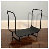 BLACK LOG HOLDER | Of modern design; h. 21-1/2 x w. 25-1/2 in.
