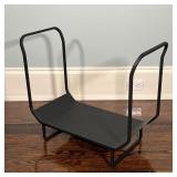 BLACK LOG HOLDER | Of modern design; h. 21-1/2 x w. 25-1/2 in.