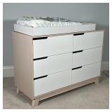 CONTEMPORARY DRESSER | Baby changing table, having six drawers with offset open pulls; 33-1/2 x 48 x
