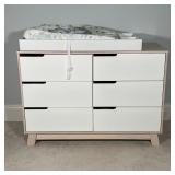CONTEMPORARY DRESSER | Baby changing table, having six drawers with offset open pulls; 33-1/2 x 48 x