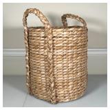 WOVEN BASKET | Woven basket with carrying handles; h. 17 (over handles) x dia. 12 in.