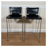 PAIR BARSTOOLS | Bar stools with black seats on chrome frames; h. 34-3/4 x w. 16-1/2 x d. 16 in.
