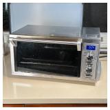 DELONGHI TOASTER OVEN | Stainless steel, working; h. 9-1/2 x w. 17-1/2 x d. 15 in.