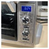 DELONGHI TOASTER OVEN | Stainless steel, working; h. 9-1/2 x w. 17-1/2 x d. 15 in.