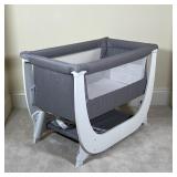 BEABA CRIB | Beaba by Shnuggle baby crib with netted sides and a pad bottom; 29 x 37 x 23 in.
