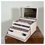 WOLF TRAVEL LEATHER JEWELRY BOX | White quilted exterior; 8 x 13 x 9 in.