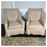 PAIR FANCY ARMCHAIRS | With linen slip covers, green silk underneath; h. 37 x 30 x 36 in. [staining 