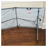 PDG FOLDING TABLE | Folds in half for easy transportation, with carrying handle; folded 35-1/2 x 29 