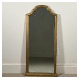 GILT BEVELED MIRROR | Beveled glass mirror in a fancy gilt frame; h. 47 x 20-1/2 in.