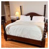Twisted carved four poster bed, appears to be king size; h. 78 x w. 82 x l. 92 in. [mattress not inc
