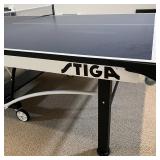 STIGA PING PONG TABLE | Model T8742, with four paddles, in excellent condition; h. 29-1/2 x w. 60-1/