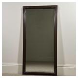 FANCY TALL MIRROR | Beveled glass wall mirror in a flower decorated frame; h. 46 x 23 in.