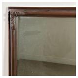 FANCY TALL MIRROR | Beveled glass wall mirror in a flower decorated frame; h. 46 x 23 in.