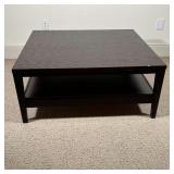 Dark espresso wood coffee table with a medial shelf; h. 17 x 40 x 40 in. [some markings, a few small