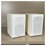 pair of white Pinnacle bookshelf speakers (BD 500) and a black Pinnacle BD 300 speaker