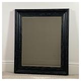 BLACK PAINTED MIRROR | Beveled glass mirror in a black painted wood frame; overall 38-1/4 x 32-1/4 i