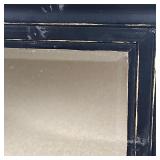 BLACK PAINTED MIRROR | Beveled glass mirror in a black painted wood frame; overall 38-1/4 x 32-1/4 i