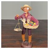 PAIR FRENCH POTTERY FIGURES | Man and woman with scales, each signed S. Peiraho; h. 11 in.