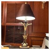 FAUX ANTLER TABLE LAMP | With a leather style shade; overall h. 34 x dia. 15 in.