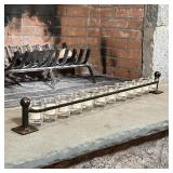 JAN BARBOGLIO VOTIVE HOLDER | Wrought iron frame suspending glass candle holders; h. 5 x w. 41 in.