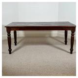Solid wood dining table on tapering legs, some wear to top but appearing in overall excellent condit