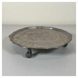 EARLY PEWTER TRVIET | Ball and claw feet; dia. 10