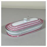 MAJOLICA BUTTER DISH | Covered butter dish with pink and green stripes; l. 8.5 in.