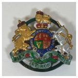 KINGS ARMS TRIVET | Painted cast iron with the royal coat of arms; dia 6 inches