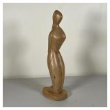 MONKEYPOD WOOD CARVING | Carved wood figure of a woman, marked on the bottom "Monkeypod Wood"; h. 19