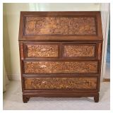 CHINESE CARVED SLANT LID DESK | Having blind carved panels with figures engaged in various scenes; h