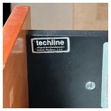 Heavy and solid, having a bank of drawers and a slide out keyboard tray; h. 29 x w. 48 x d. 25 in. [