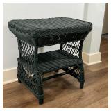 PAINTED WICKER SIDE TABLE | Black painted wicker, with medial shelf; h. 23 x 25 x 17 in.