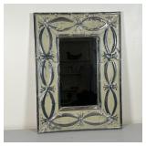 PRESSED TIN MIRROR | Having a painted patterned pressed tin frame; overall 22 x 16 in.