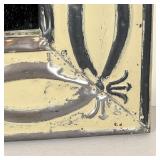 PRESSED TIN MIRROR | Having a painted patterned pressed tin frame; overall 22 x 16 in.