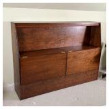 headboard cabinet with two fold-down doors, interior with empty space and drilled for wiring, birch 