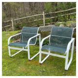 PAIR BROWN JORDAN PATIO CHAIRS | Brown Jordan patio armchairs with green woven mesh seats on a white
