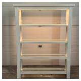 White 5 tier shelving unit / display shelf, each shelf with glass insert, having a light up panel on