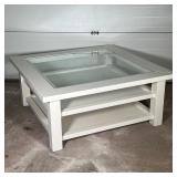 RESTORATION HARDWARE LOW TABLE | White Restoration Hardware coffee table with glass top and two medi