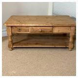 PINE COFFEE TABLE | Rounded edge natural finish pine low coffee table with a single drawer and botto