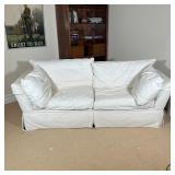 RESTORATION HARDWARE SOFA | Cream colored canvas upholstery; 31 x 38 x 88 in. [some minor staining]