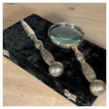Comes in a felt box, patinated silver style handles with etched design