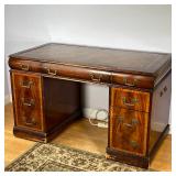 FANCY WOOD DESK | Lacquered wood desk with inset leather top and gilt scroll work border over drawer