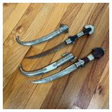 DAGGERS | Wood handles and brass and silver inlays, each with a sheath, one full etched silver sheat