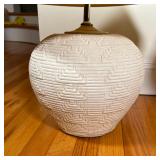One with engraved stoneware base (h. 26 in.), Second smooth white ceramic base with matching finial 