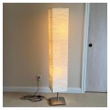 CONTEMPORARY POLE LAMP | Paper lamp with three bulbs covered by a ruffled square column paper shade 