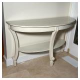 DEMILUNE HALL TABLE | By Stanley Furniture, white painted wood with one lower shelf; h. 31-1/2 x 51 